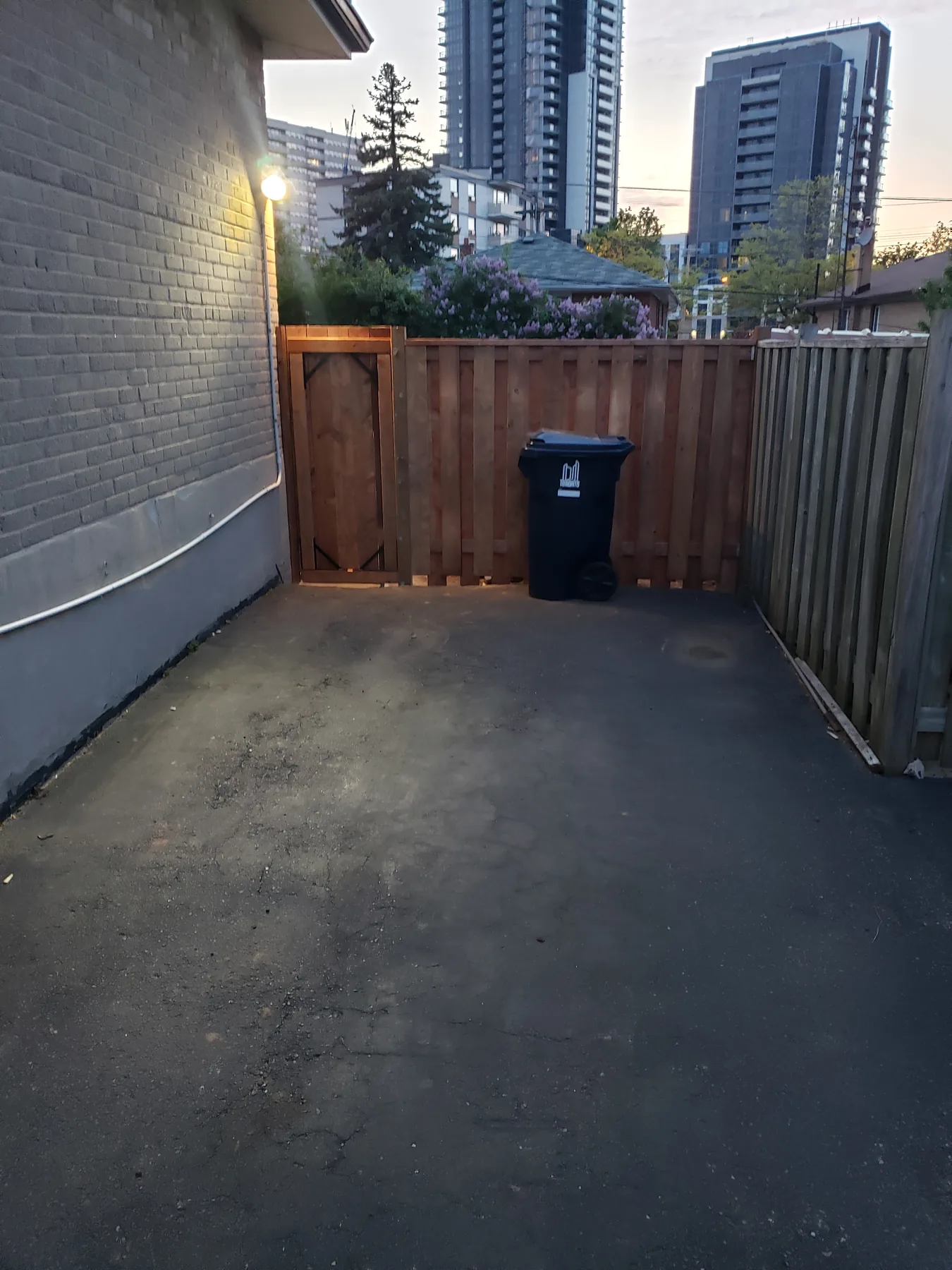Completed cedar access section beside a residential driveway