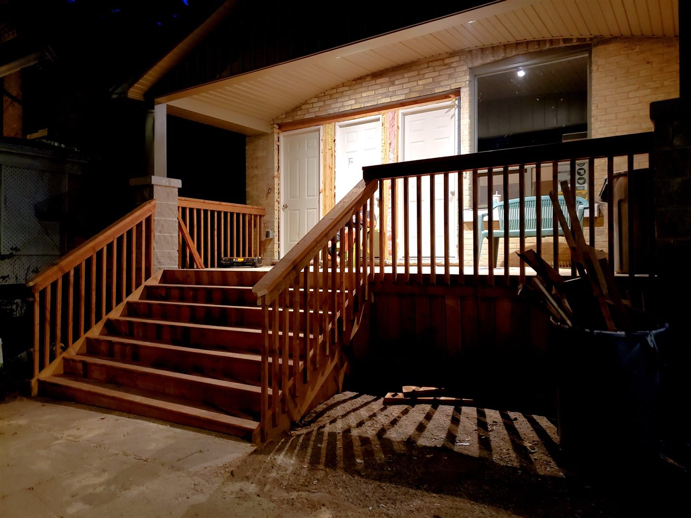 Completed wooden front deck and stairs