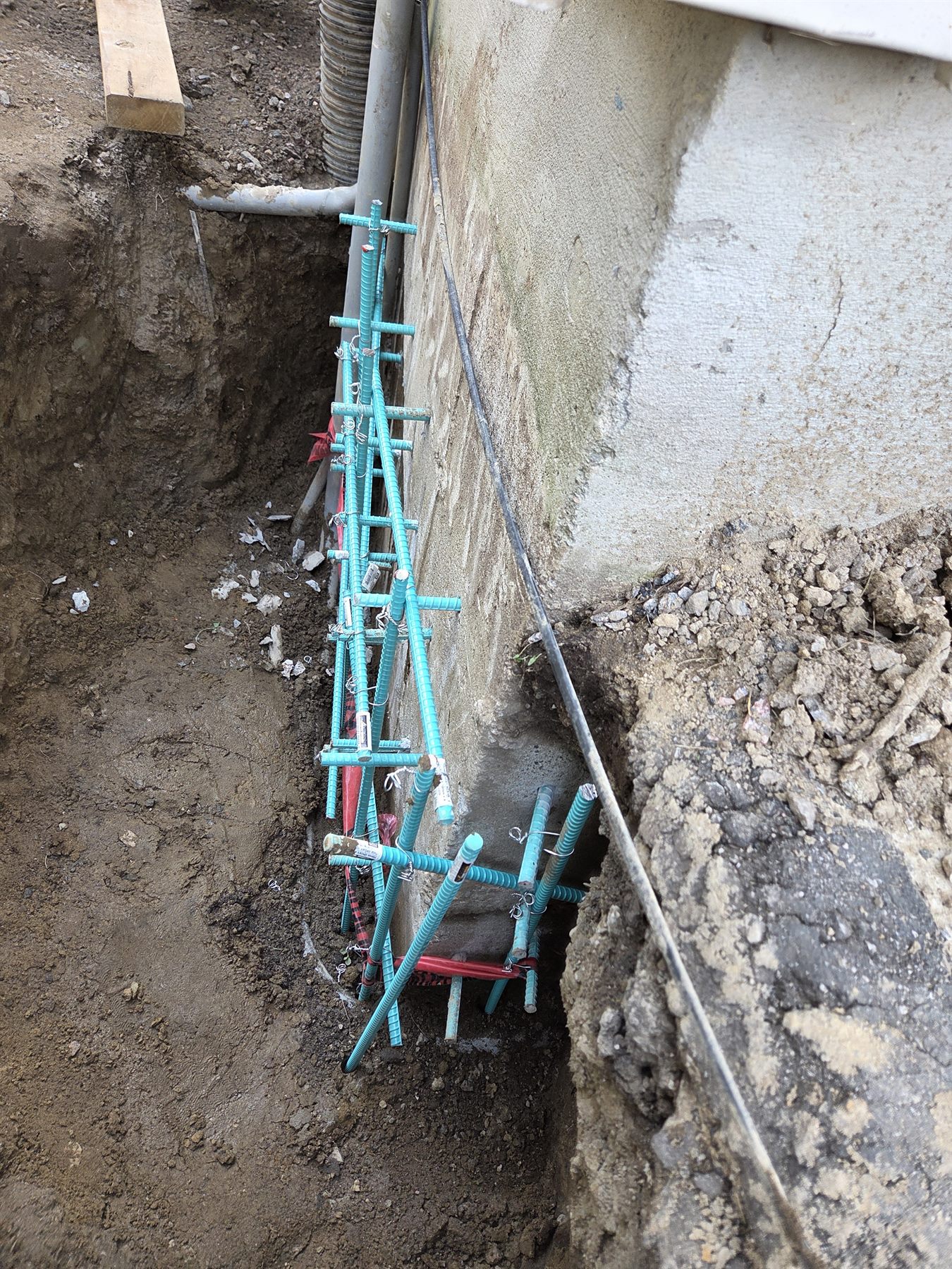 Rebar reinforcement detailed at a foundation repair corner