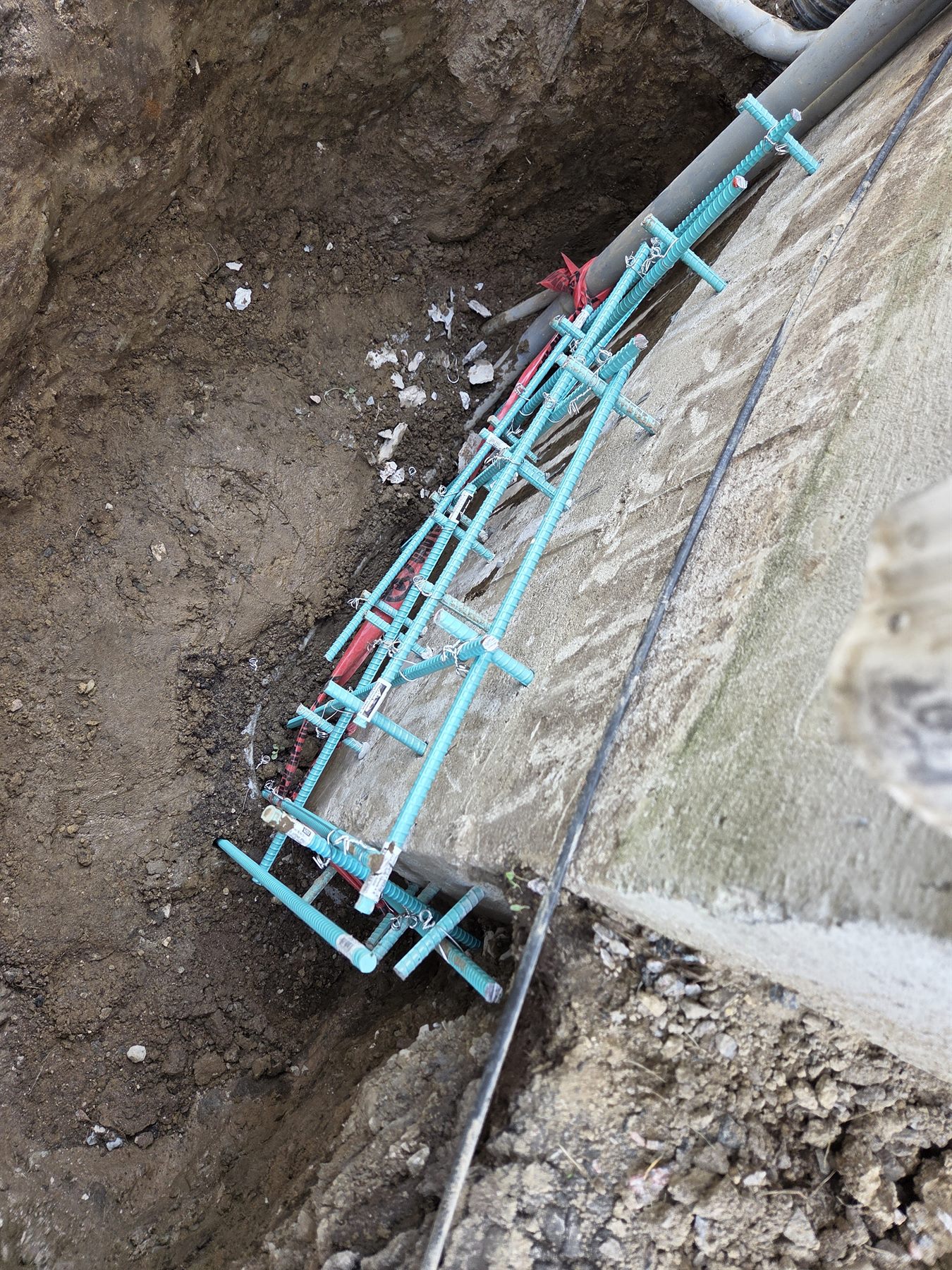 Foundation repair formwork and reinforcement in the excavated area