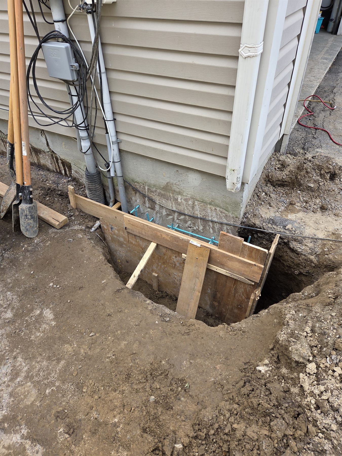 Excavated foundation repair area with formwork in place