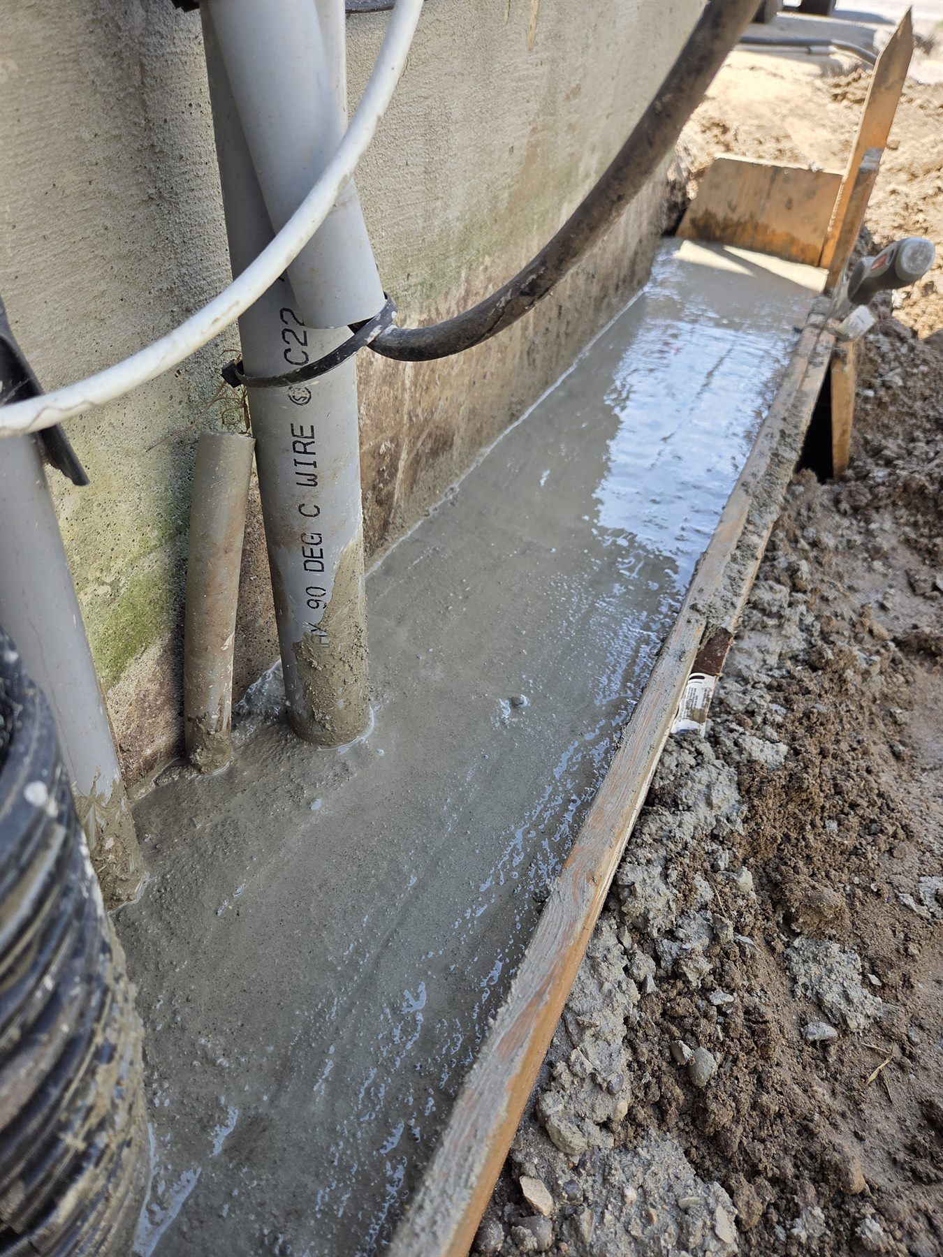 Close view of the newly placed concrete footing