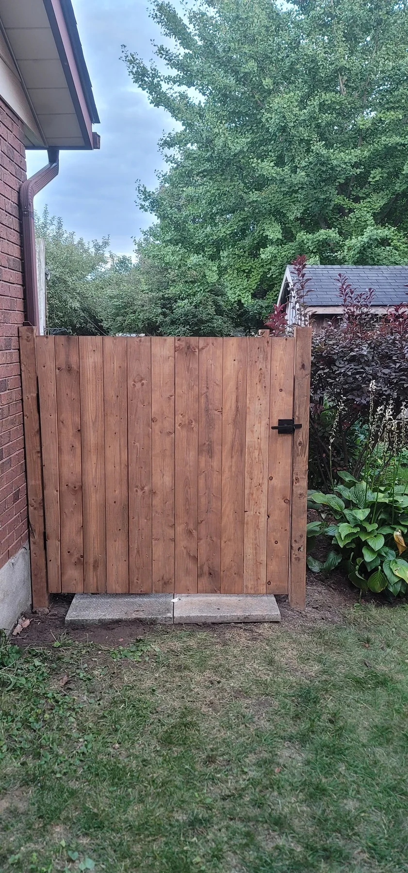 Completed coordinating wood access gate