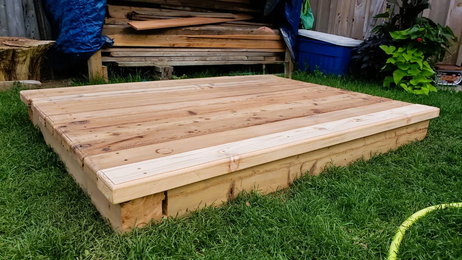 Low cedar grill platform during construction