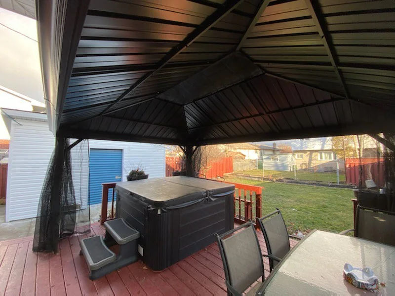 Interior view of the covered gazebo over the deck and hot tub