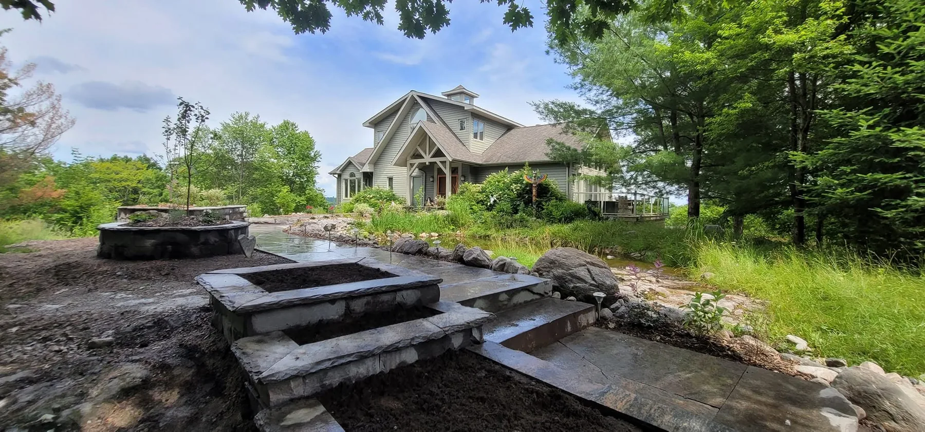 Granite entry terraced stonework overview
