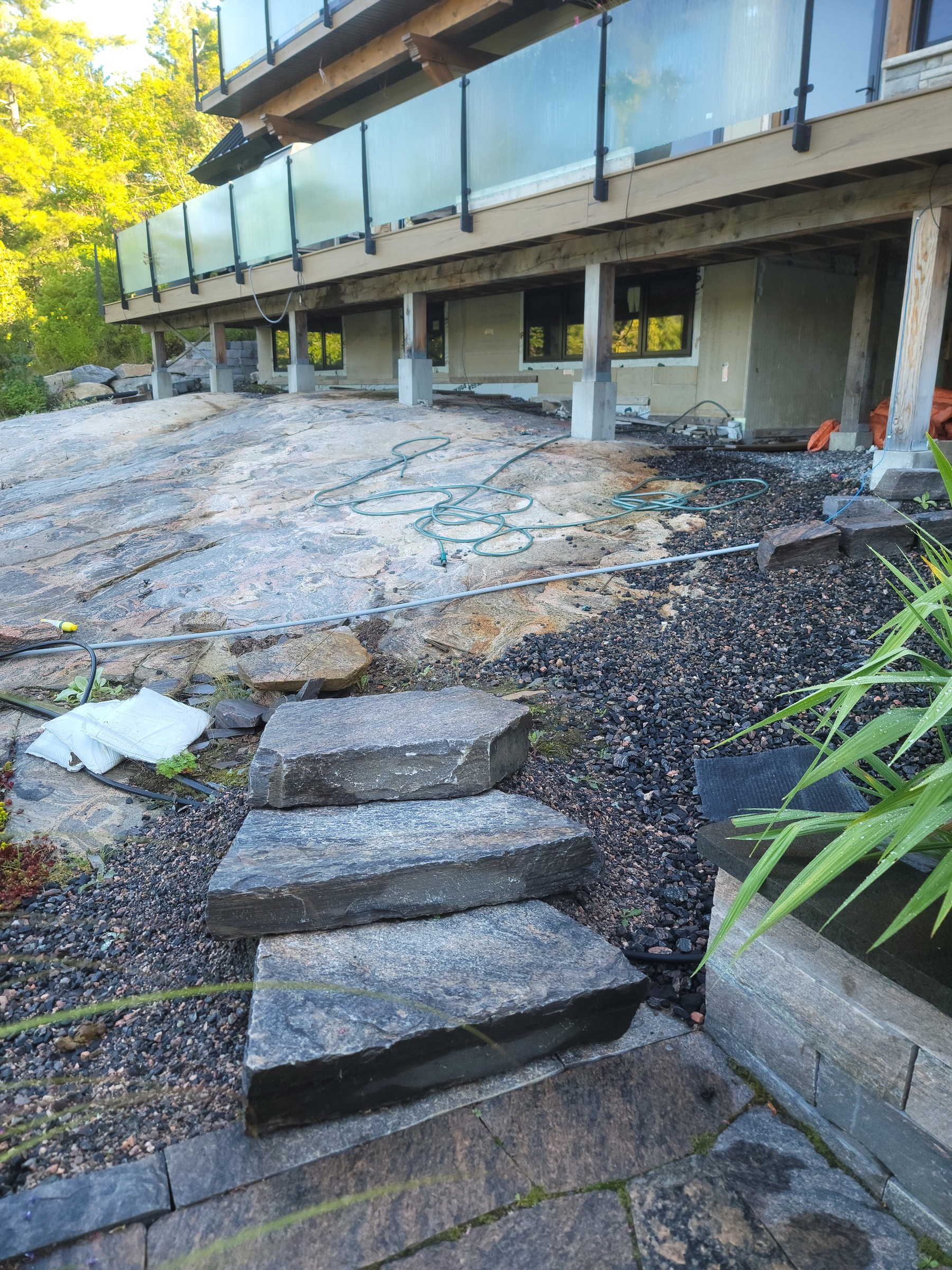 Completed flagstone stair route with stone wall edges