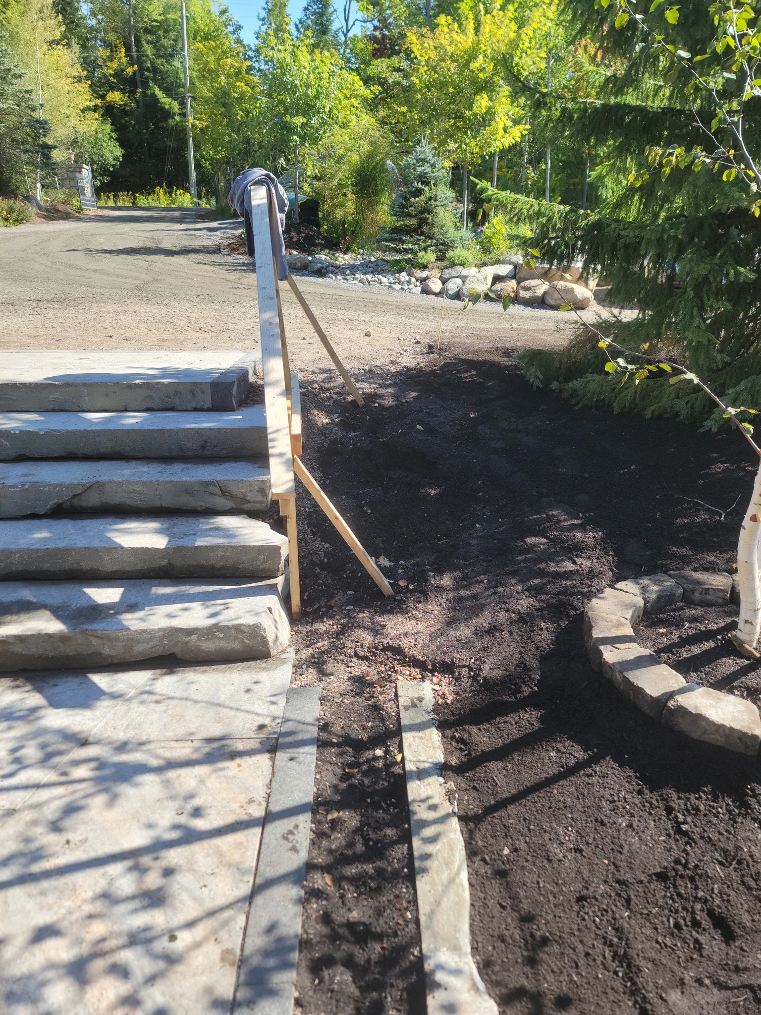 Front entry steps and raised planter bed preparation